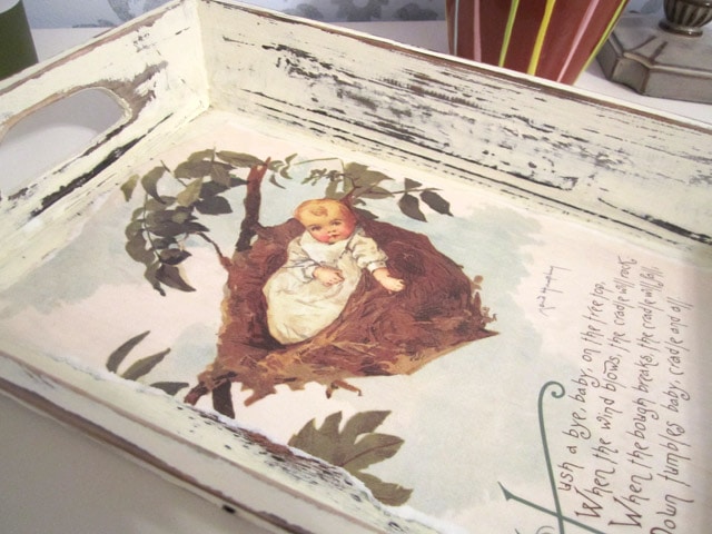 A vintage looking tray with a nursery rhyme on it.