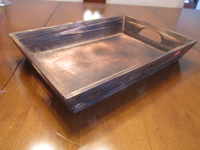 Wooden tray on the table.