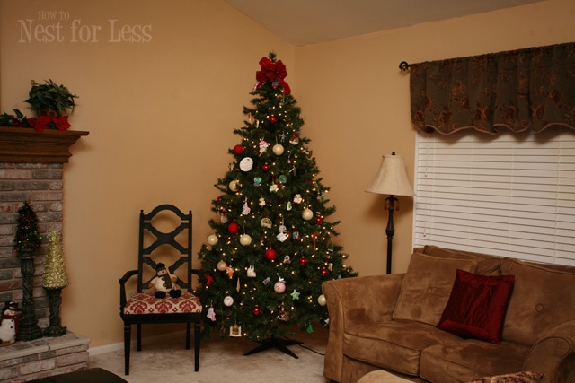 A Christmas tree in the corner of the room.