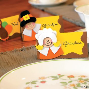 Little pilgrim placecards on the table.