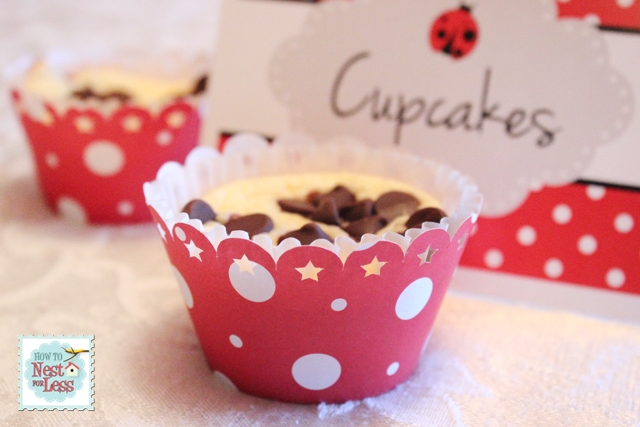 Chocolate chip cupcakes in a red and white dotted cupcake holder.