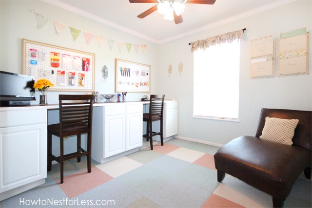 Craft room interior with desk, chairs and lounger.