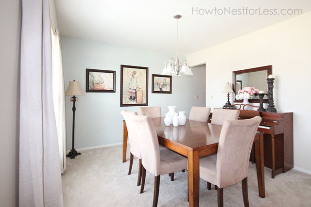 dining room with fabric chairs with walls painted Sherwin Williams Sea Salt