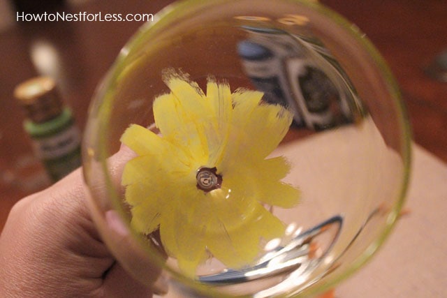 Looking at the yellow paint from the inside of the wine glass.