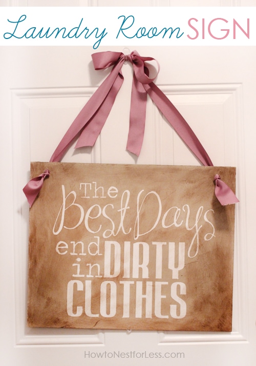 The Best Days laundry sign with a pink ribbon hanging on the door.