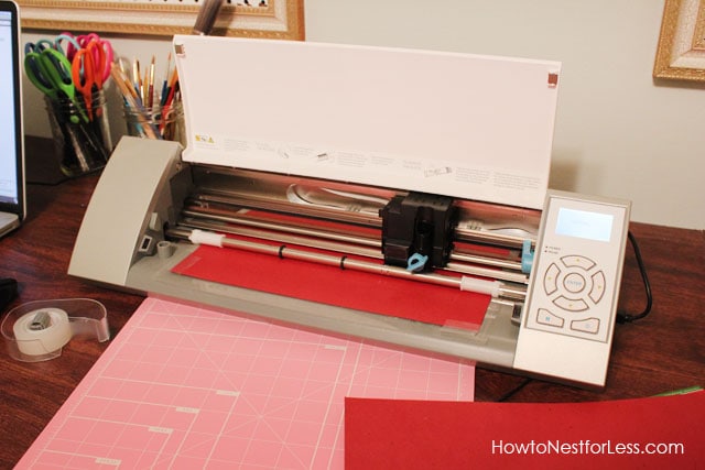 A silhouette printing machine on the table.