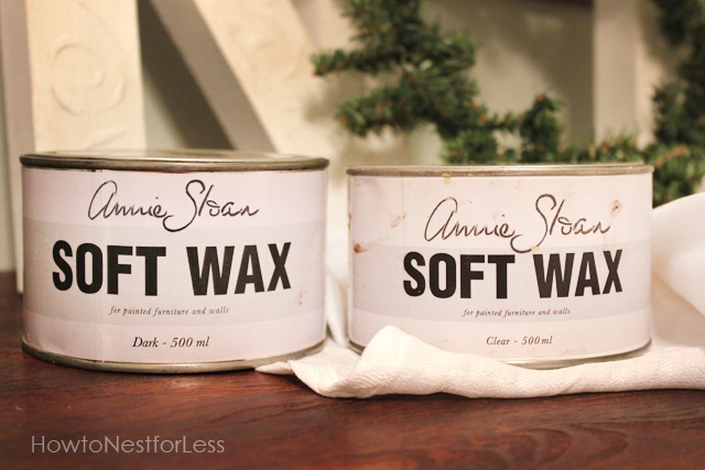 Two cans of Annie Sloan soft wax on the table.