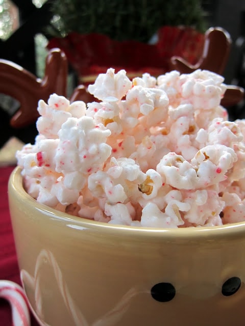 A bowl of popcorn dipped in a peppermint coating.