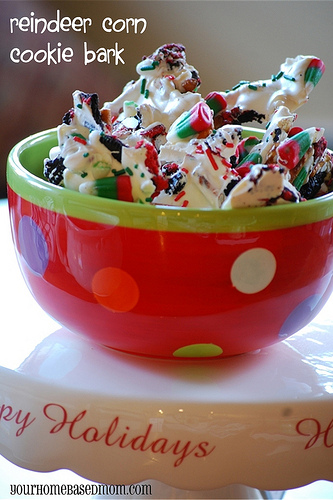 A red bowl full of reindeer candy corn.