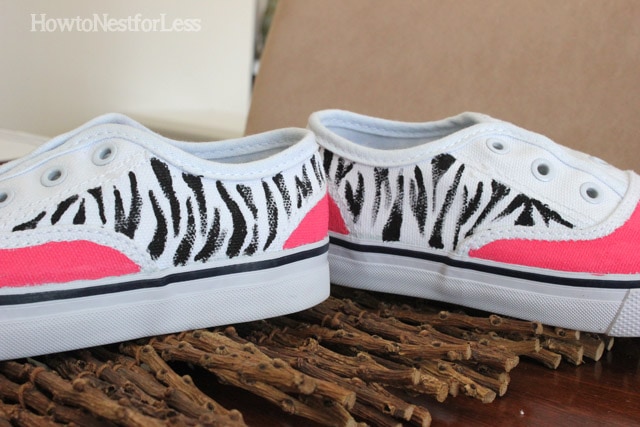 Painted zebra stripes on the tennis shoes.