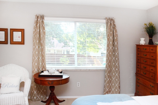 Stenciled brown and white curtains in the bedroom.