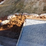 Rock retaining wall patio.