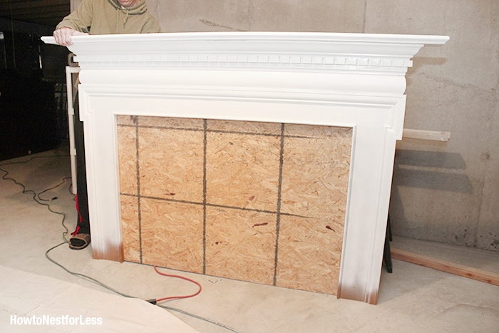 white fireplace mantel headboard