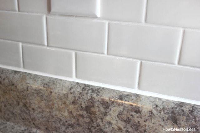 Caulk White Subway Tile Backsplash Tutorial How To Nest For Less   Caulk White Subway Tile Backsplash Tutorial 640x426 