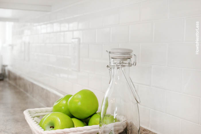 white tile kitchen backsplash