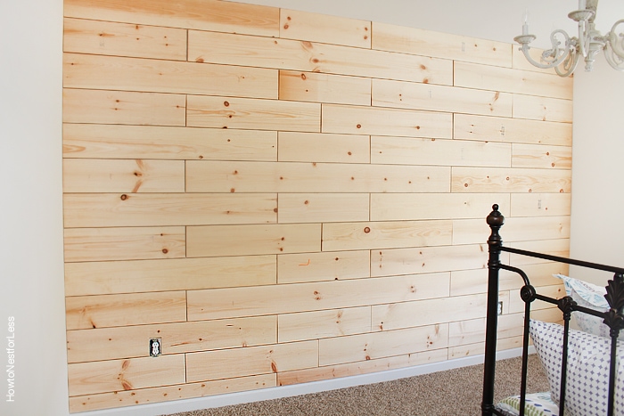 The planked wall completed in girls bedroom.