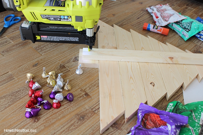 The wooden Christmas tree being nailed together.