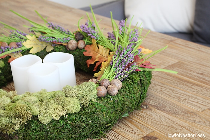 The green and rust colors of fall on the wreath.