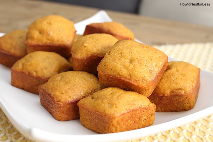 The orange pumpkin walnut cake on a plate.