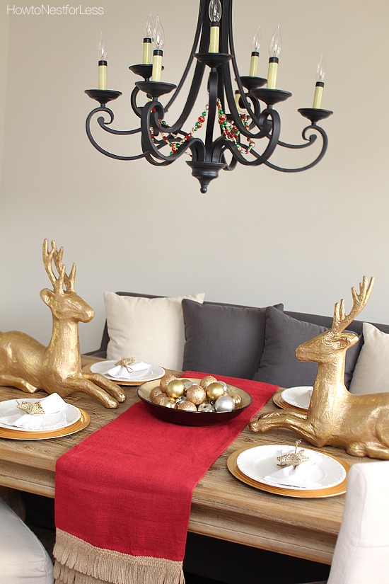 The metal chandelier above the dining room table.