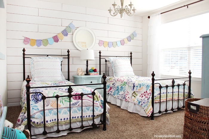 girl white planked wall bedroom