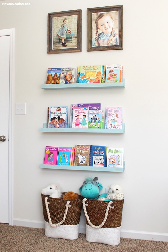 The bookshelves in a little girls room.