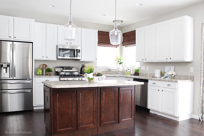 White kitchen cabinets with deals dark island