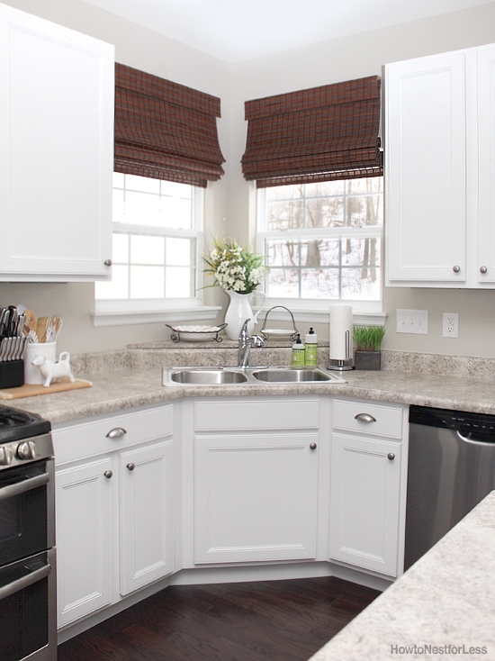 white cabinets dark flooring