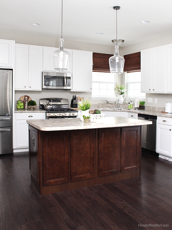 white kitchen cabinets dark island