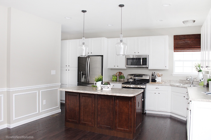 white kitchen cabinets wood island