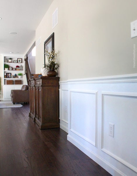 Chair rail molding and picture frame molding on the lower portion of a wall.