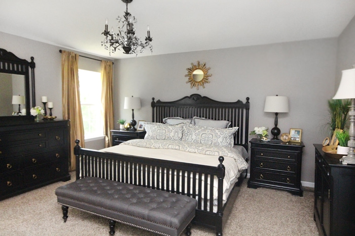 gold and black master bedroom