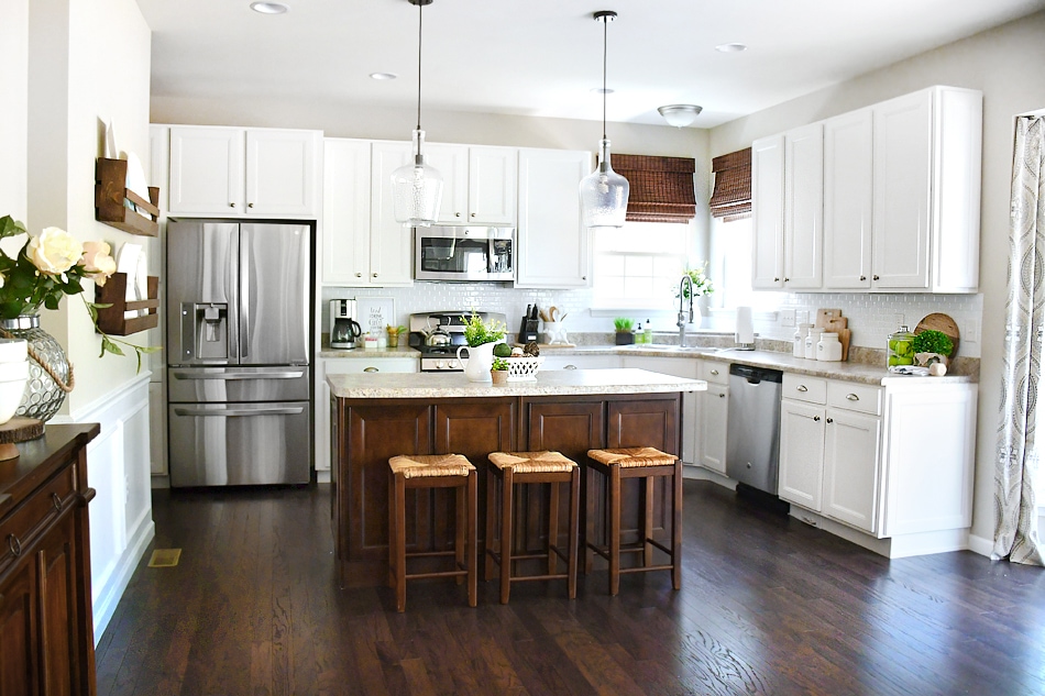 white cabinets, dark kitchen island for your home