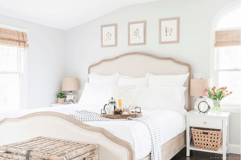 White and beige neutral toned bedroom.