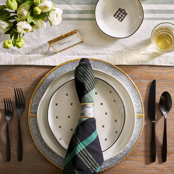 Plaid napkin on a dinner setting.