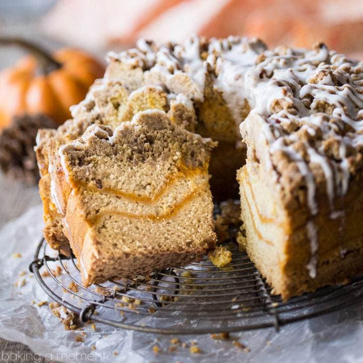 Coffee cake made with pumpkin on a cooling rack.