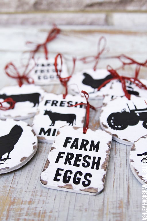 Farm fresh eggs with cows and tractors in black and white with red ties for the tree.