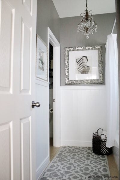 bright white bottom hallway with Sherwin Williams Dorian Gray painted on top