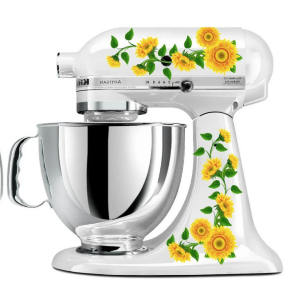 white kitchenaid mixer with sunflower decals on the body